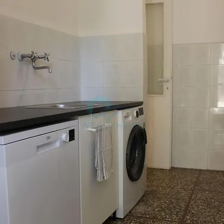 P R A T I Cozy Urban Escape *